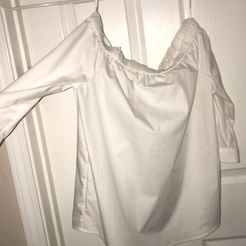 off the shoulder Calvin Klein top.